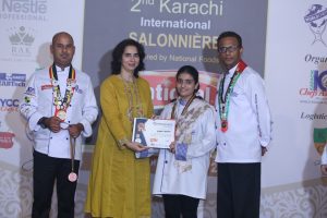 Certificates distribution ceremony at Group photo at 2nd Karachi International Salonnière 2022