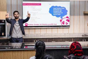 foodpanda Regional Sales Manager Wajeeh ul Hassan presenting on homechefs initiative at COTHM