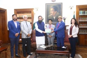 COTHM CEO Ahmad Shafiq presenting Hospitality Plus magazine to Punjab Governor Baleegh ur Rehman