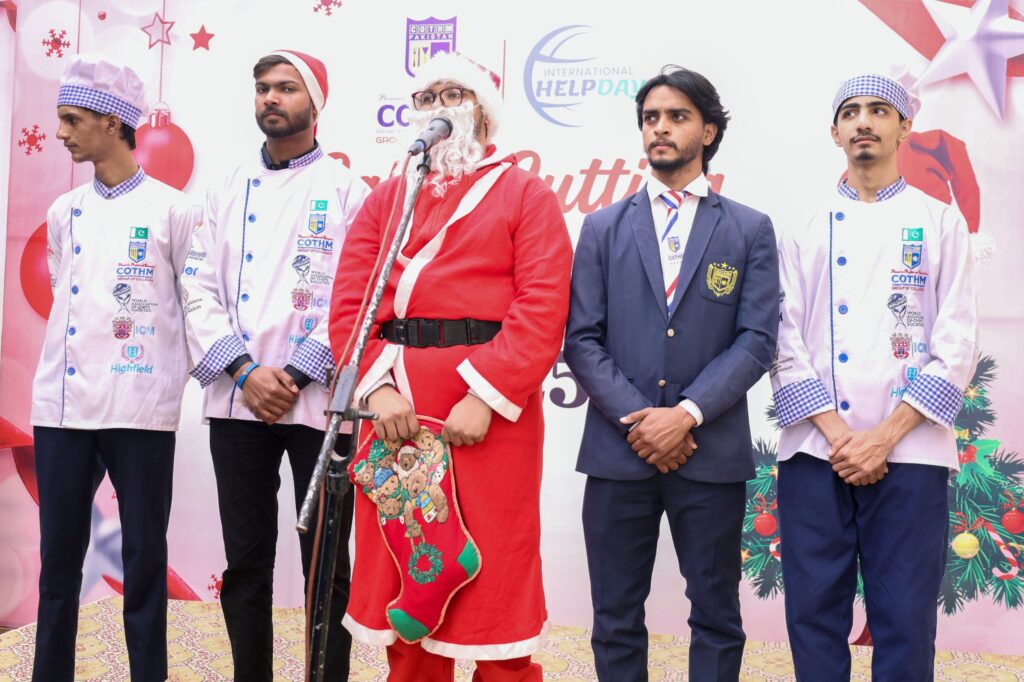 COTHM, in Collaboration with International Help Day, Celebrates Christmas with Cake-Cutting Ceremony